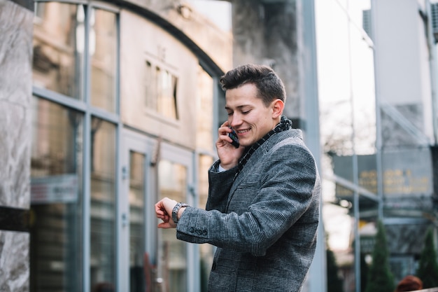 Businessman smiling and calling