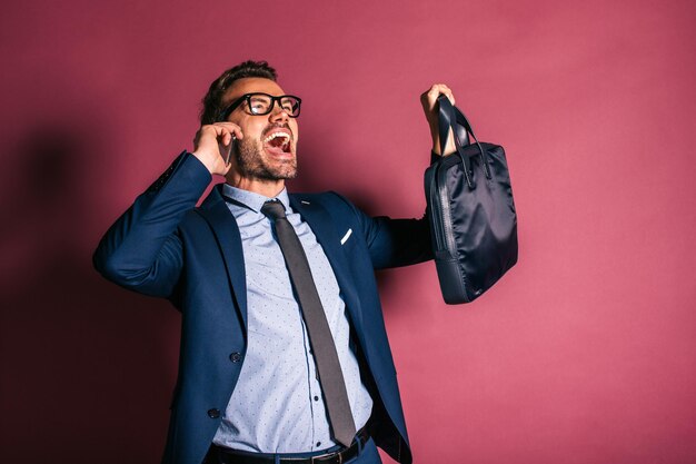 Businessman speaking on the mobile phone