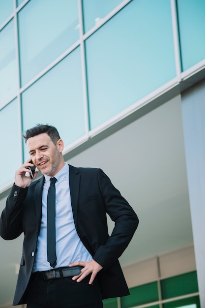 Businessman in suit calling