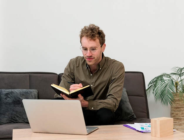 Businessman taking notes while he's having a meeting