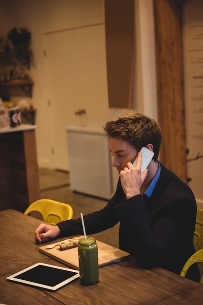 Businessman talking on mobile phone