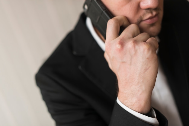 Businessman talking on smartphone