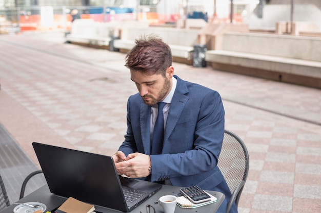 Free photo businessman on a terrace