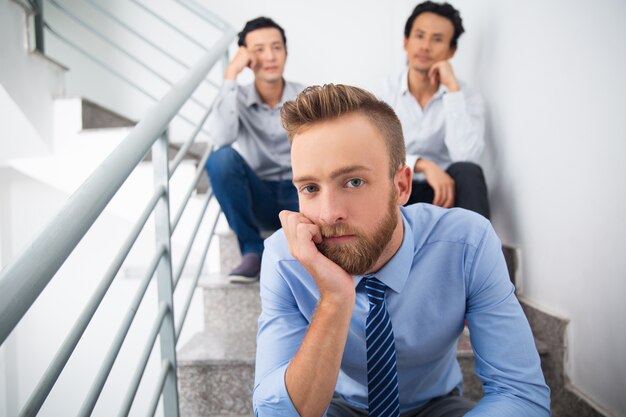 businessman tired team stairs beard