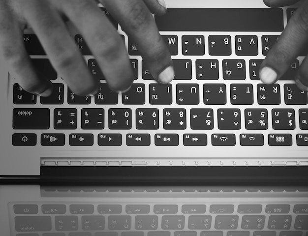 Businessman using computer laptop at work