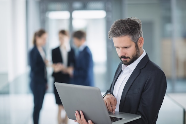 Businessman using laptop