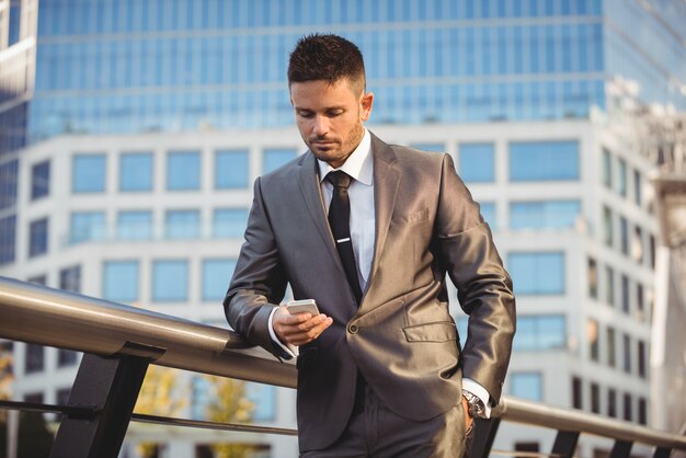 Businessman using mobile phone