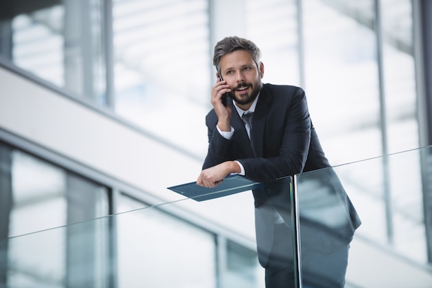 Businessman using mobile phone