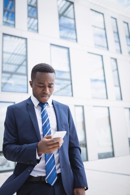 Businessman using mobile phone