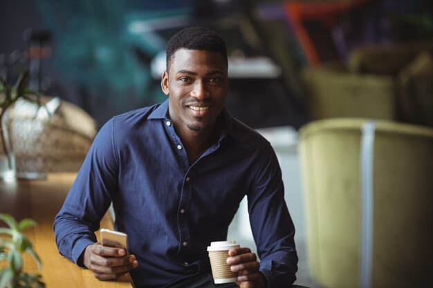 Businessman using mobile phone