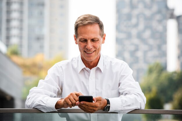 Businessman using mobile phone