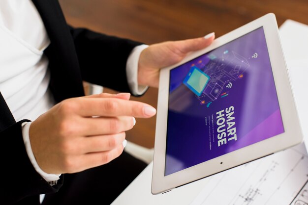 Businessman using tablet close-up