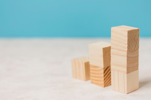 Businessman using wooden pieces 