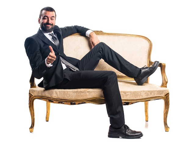 Businessman on vintage armchair