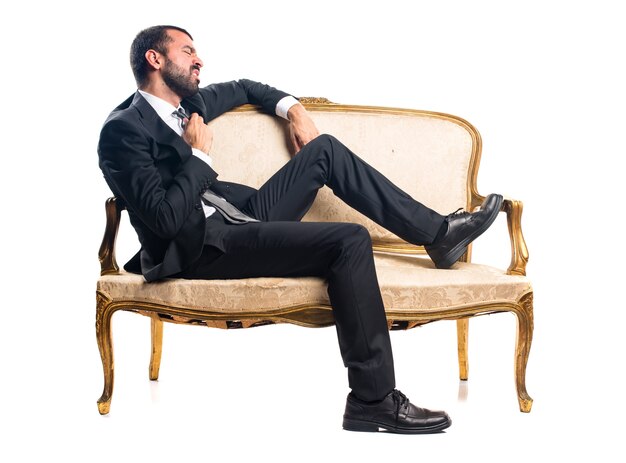 Businessman on vintage armchair