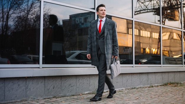 Businessman walking with a briefcase