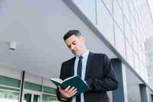 Free photo businessman with book