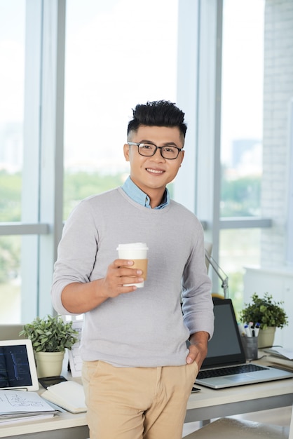 Free photo businessman with coffee