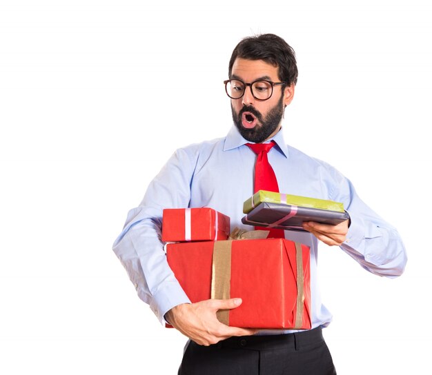 Businessman with gift over white
