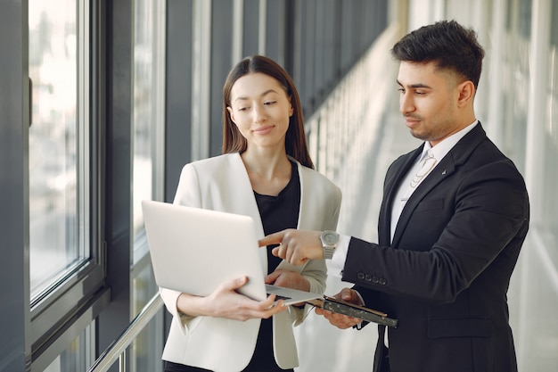 Businessman with his partner working in a office