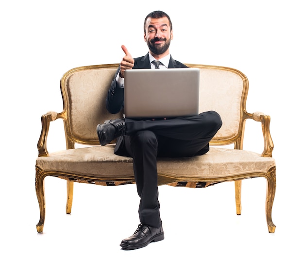 Free photo businessman with laptop