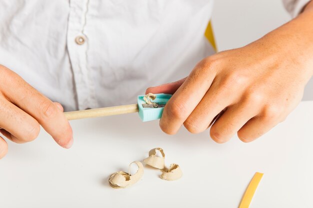 Businessman with pencil sharpener