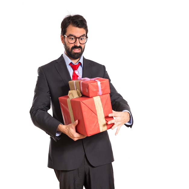 Businessman with several gifts