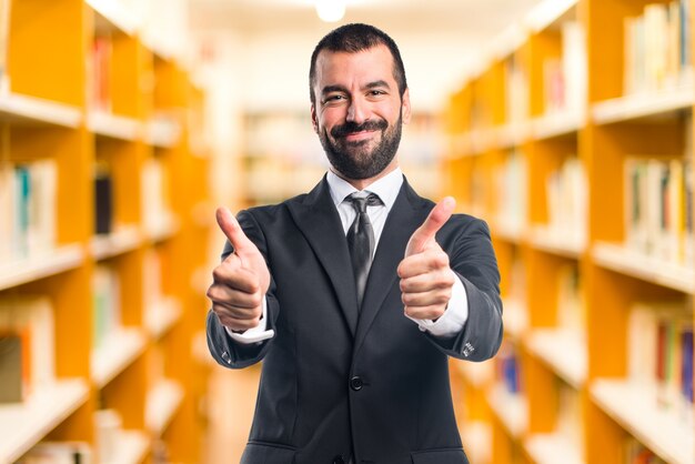 Businessman with thumb up