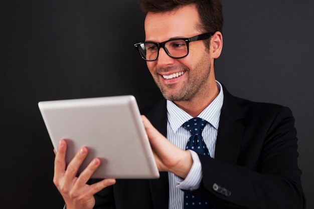 Businessman working on his touchpad