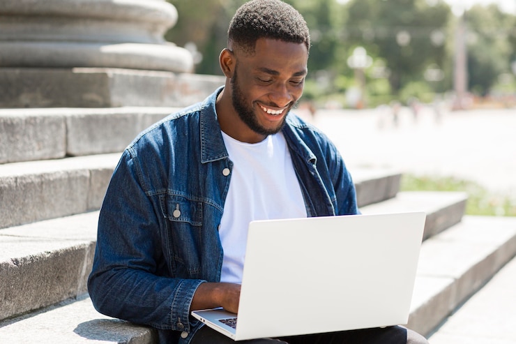 Free Photo businessman working on laptop