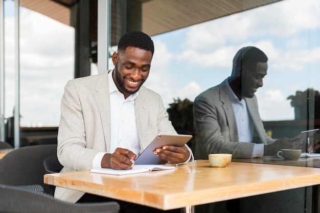 Businessman working on tablet