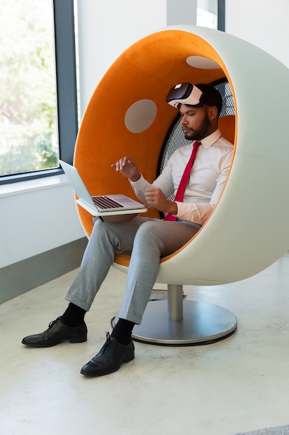 Businessman working in VR studio