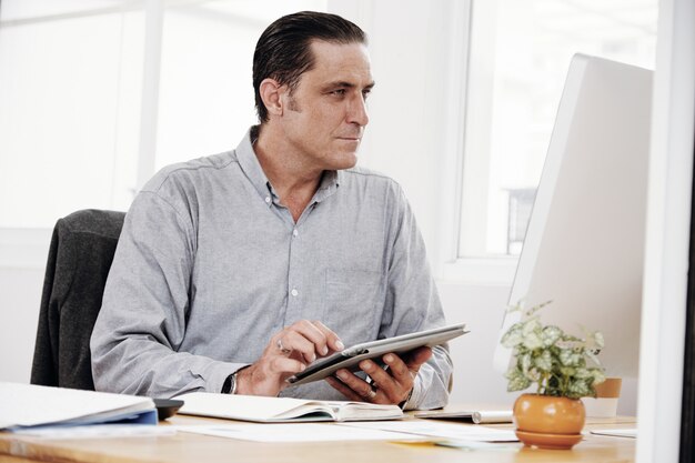 Businessman working with touchpad