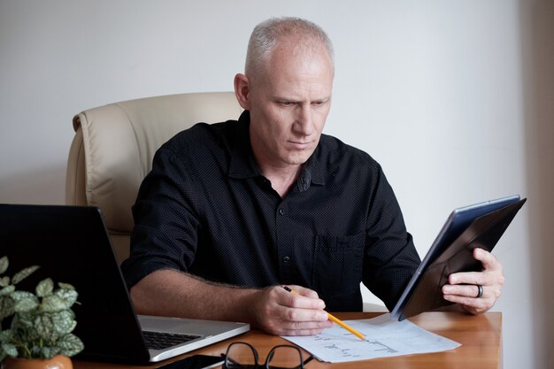 Businessman wrapped up in work