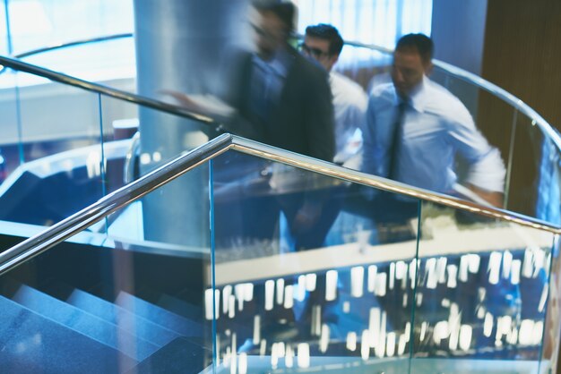 Free photo businessmen going upstairs