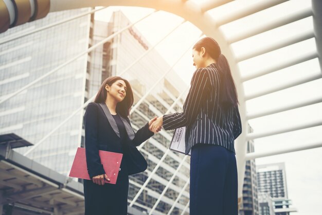 Businessmen handshake with workmate,Handshake business partner work deal together.