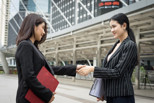 Businessmen handshake with workmate,Handshake business partner work deal together.