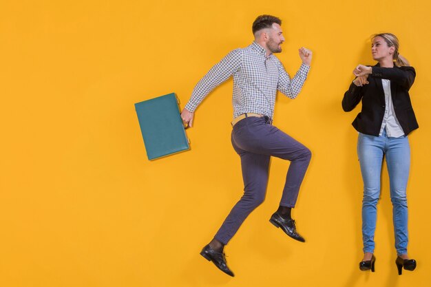 Free photo businesspeople floating with a suitcase