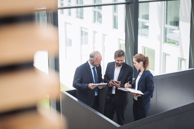 Businesspeople having a discussion in office