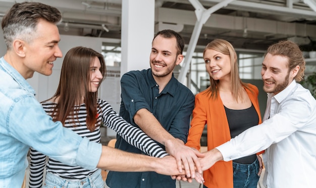 Businesspeople at office meeting hand shake