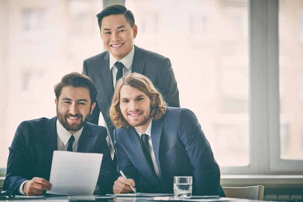 Businesspeople working with window background