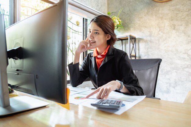 Businesswoman analyze and situation on the market strategy with partner by video conference.