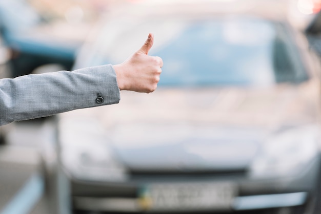 Businesswoman calling taxi