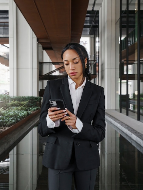 Free photo businesswoman checking app