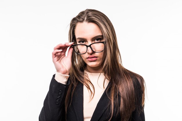 Businesswoman in classic black suite and glasses on white