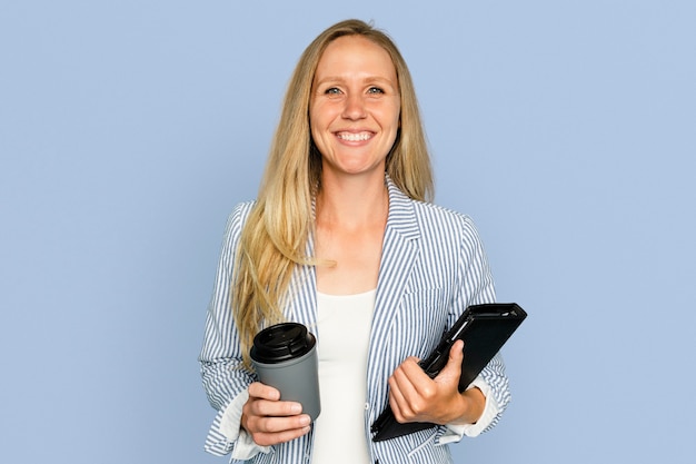 Businesswoman holding coffee cup