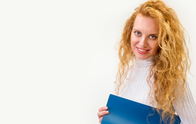 Businesswoman holding document folder copy space