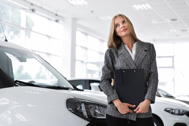 Businesswoman looking away medium shot