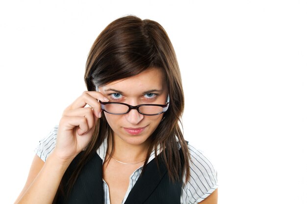 Businesswoman playing with her black glasses