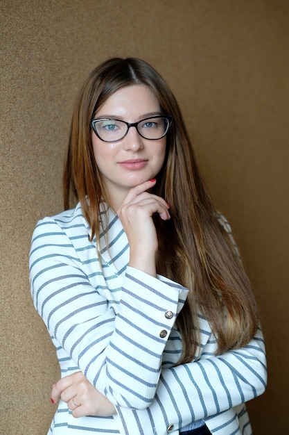 Free photo businesswoman posing at the office